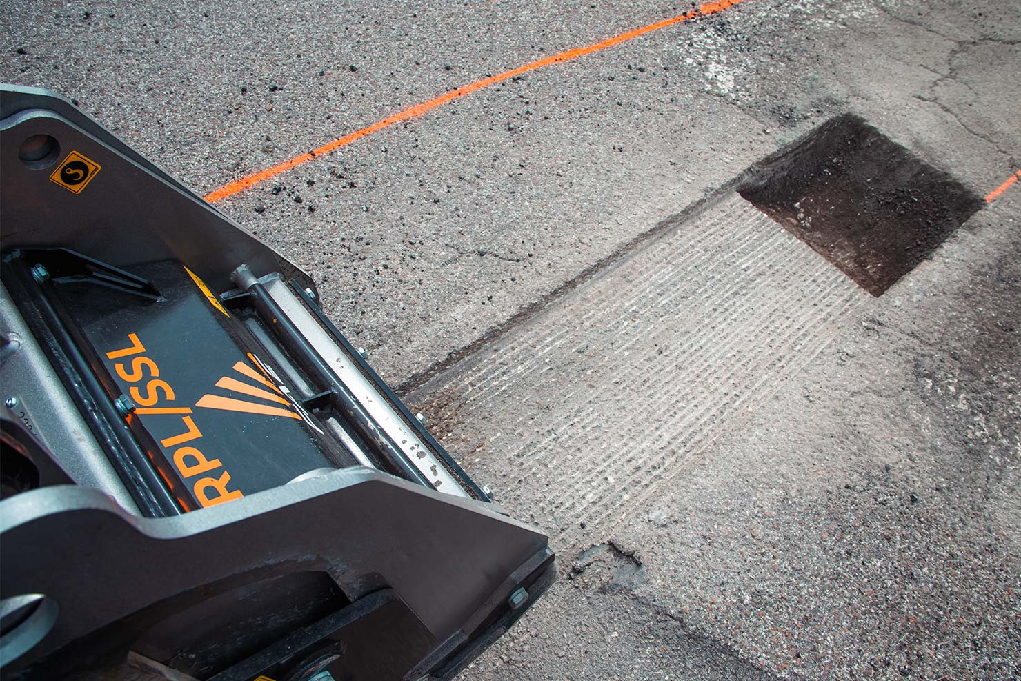 FAE RPL-SSL asfaltinjyrsin kuormaimeen